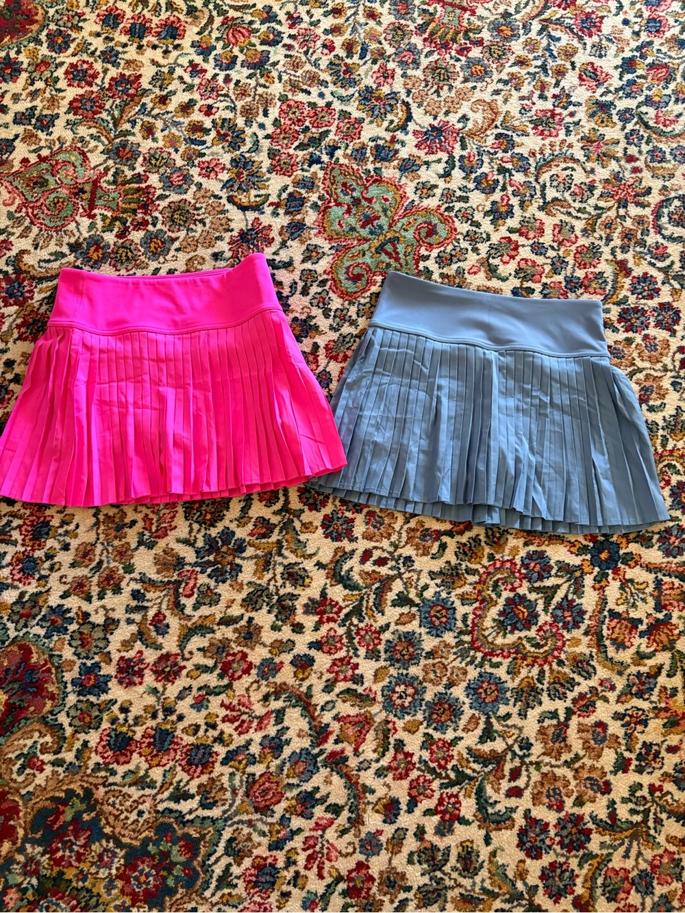 Pair of Fabletics Women's Pleated Skirts - Hot Pink and Blue Size Small